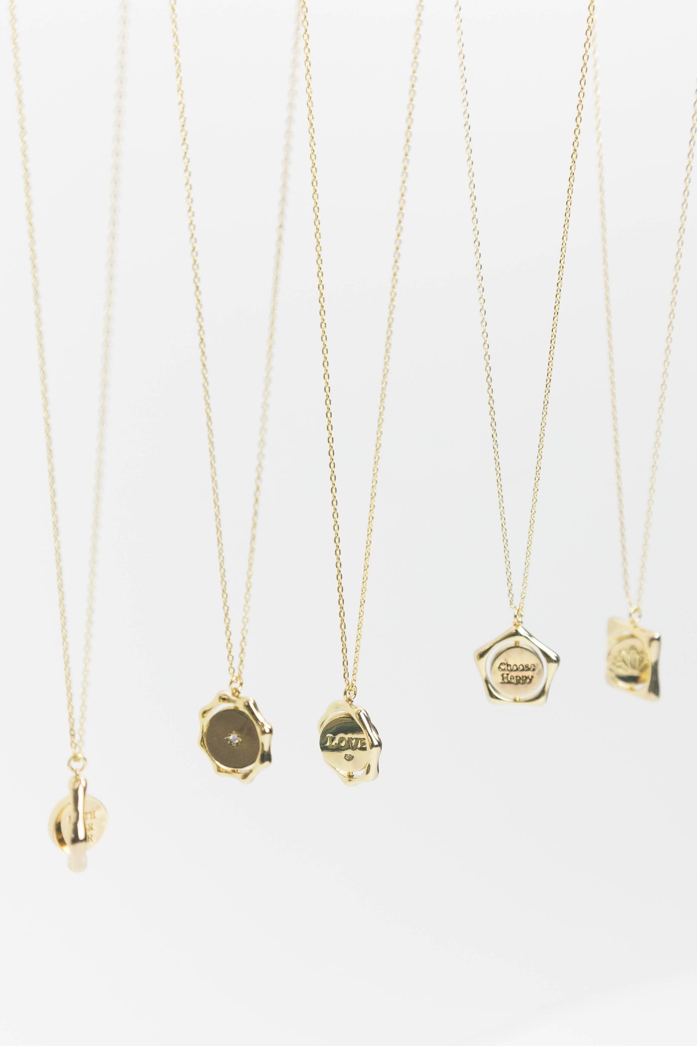 Choose Happy + Multi Starburst Flip Necklace in Gold