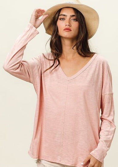 exposed seam long sleeve pink top