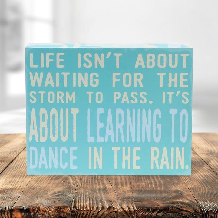 "Life Isn't About Waiting For The Storm to Pass" Box Sign